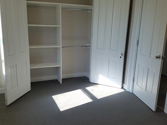 Front bedroom with built in shelving 