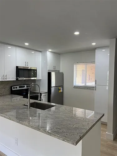 7800 Camino Real #H-307 Photo 1