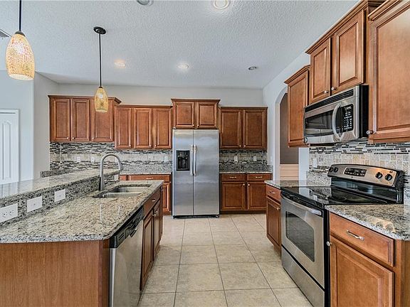 5th image of 12319 Holmwood Greens Pl