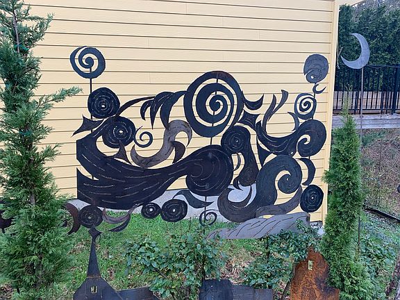 garden sculpture- starry night- break between houses