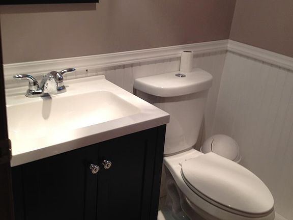 Remodeled 2nd bathroom: new sink/cabinet and toilet, new flo