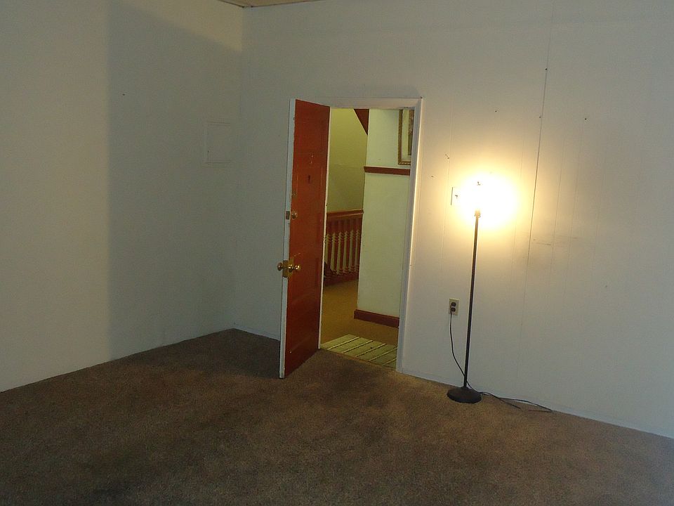 Living room with guest closet