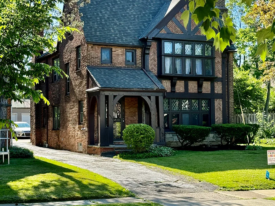 Classic Shaker Heights duplex with strong curb appeal and historic charm.