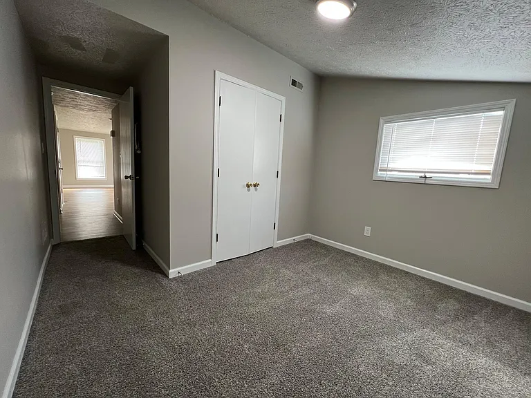 Smaller bedroom with good closet space