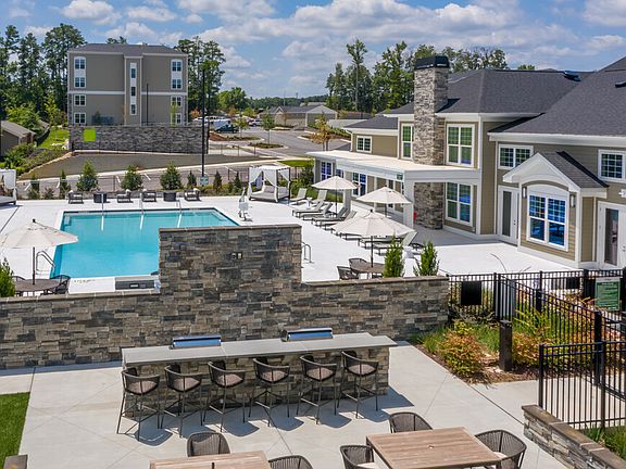 Experience luxury living with our exquisite poolside retreat, complete with modern amenities.