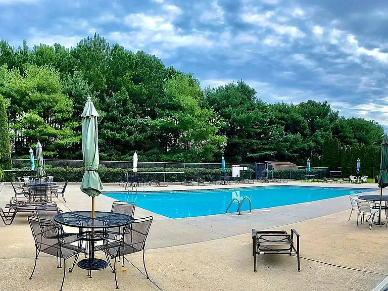 The large, lovely community pool is just around the corner!