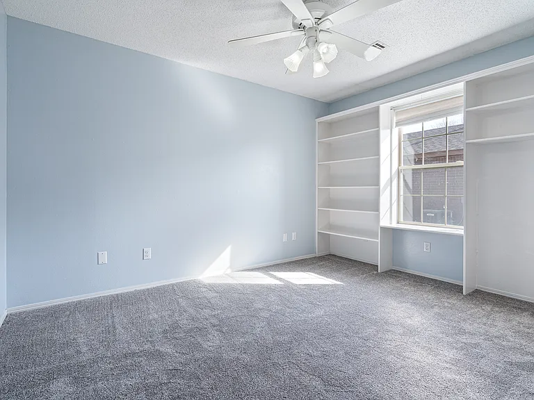 2nd Bedroom has 2 closets and built in shelving. Brand new carpet and paint on walls