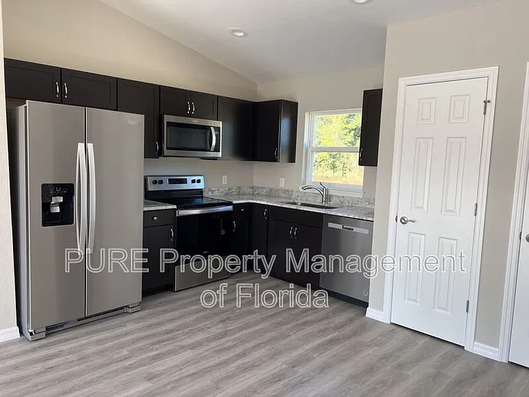 6577 SW 140th Place Rd #2 — Photo 6