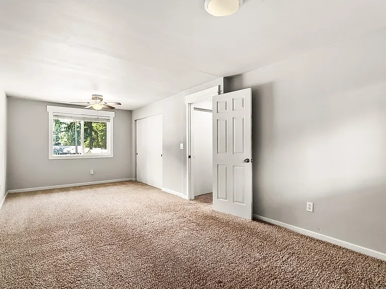 Upper level Primary Bedroom. Currently with updated LVP Flooring.