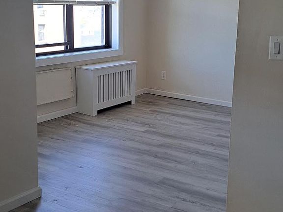 Jumbo living room and separate room for bedroom. New floors