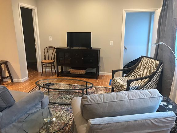 View from Murphy bed to entry door. Separate room to left.