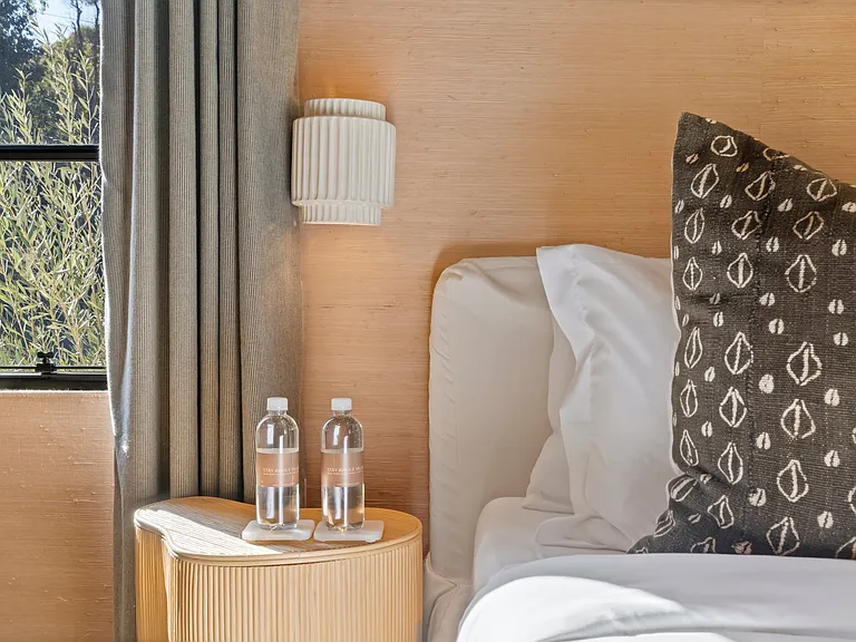 Soft lighting, rich textures, and every detail curated for comfort.