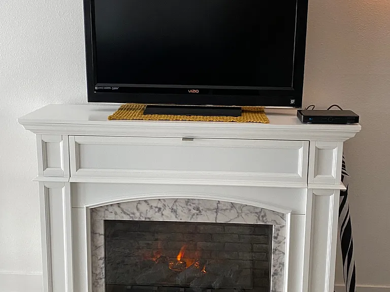 New electric fireplace and heater.