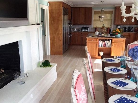 Kitchen and dining with double sided fireplace