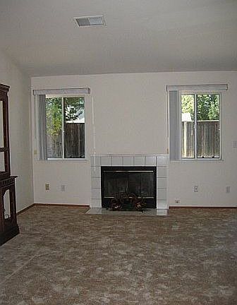 Woodburning Fireplace in Family Room