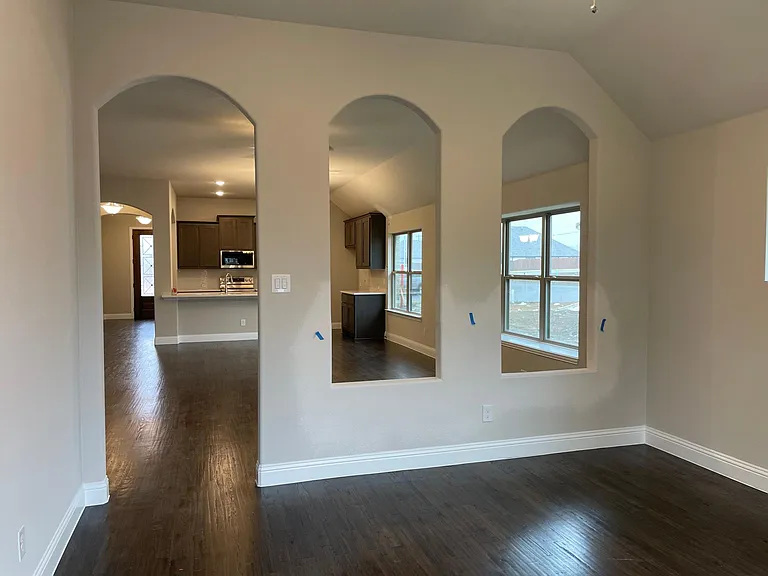 View of Living area and kitchen from Sunroom