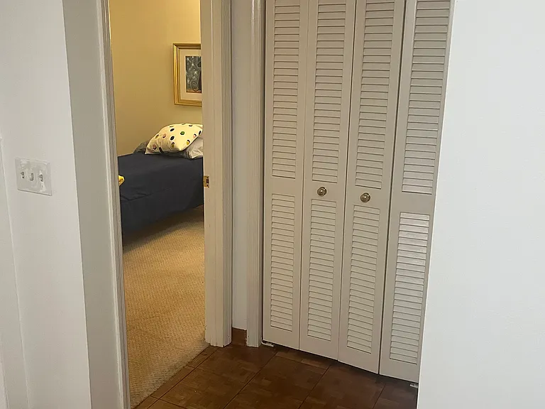 Master bedroom with separate office ( pocket door) that looks onto backyard patio.