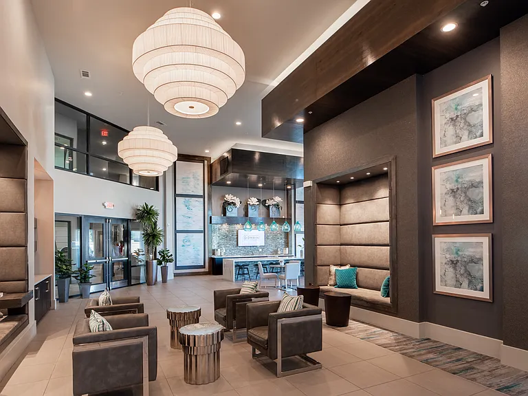 Modern Welcome Lobby with Gathering Spaces and Designer Lighting