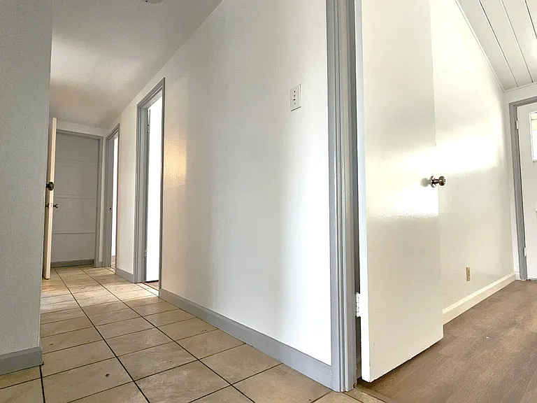 Hallway and Bedroom #4 on the right side of the photo