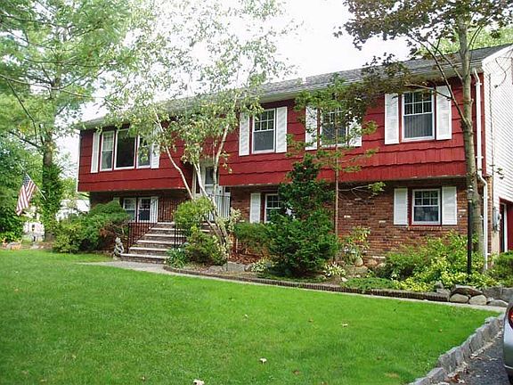 Level Property, Plenty of extra off street Parking & a 2 Car Garage 