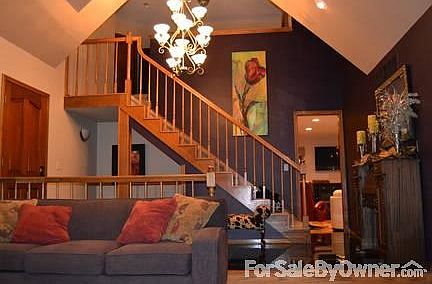 High ceilings in entry and living room