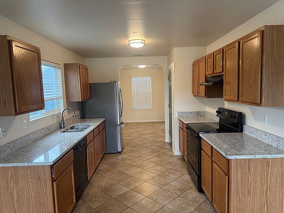 Granite countertops 
Stove, dishwasher and Refrigerator included