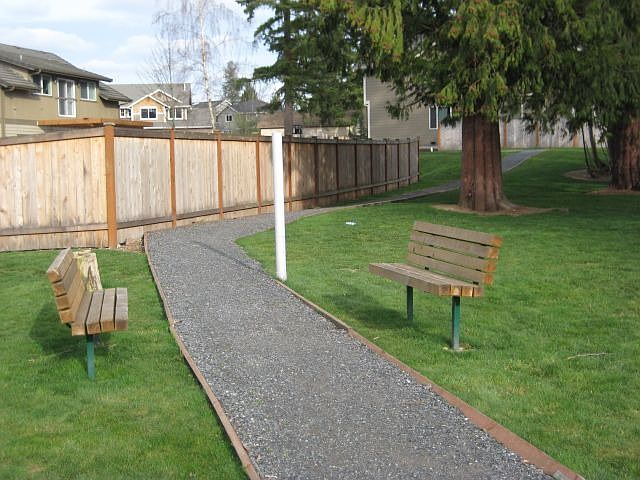 Common area neighborhood trail, benches