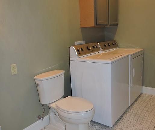 Shared powder and laundry room