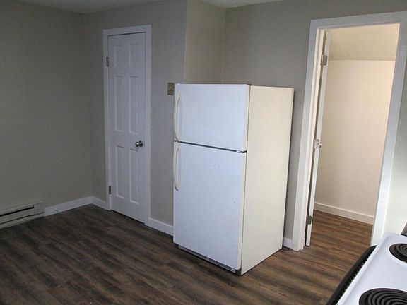 Pantry closet (left) looking into the bathroom (on the right). Standing in the LR with the bedroom door behind you.