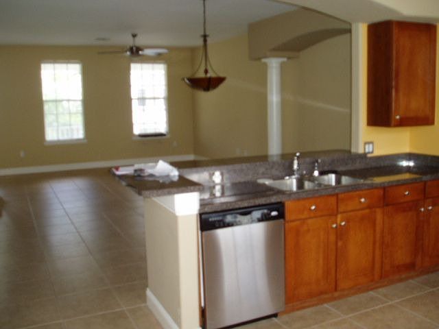Kitchen is open to great room which has a spacious dining room and living room