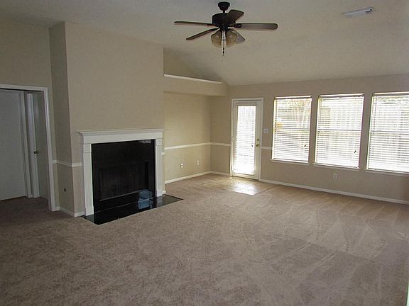 Large open living room with high ceilings.
