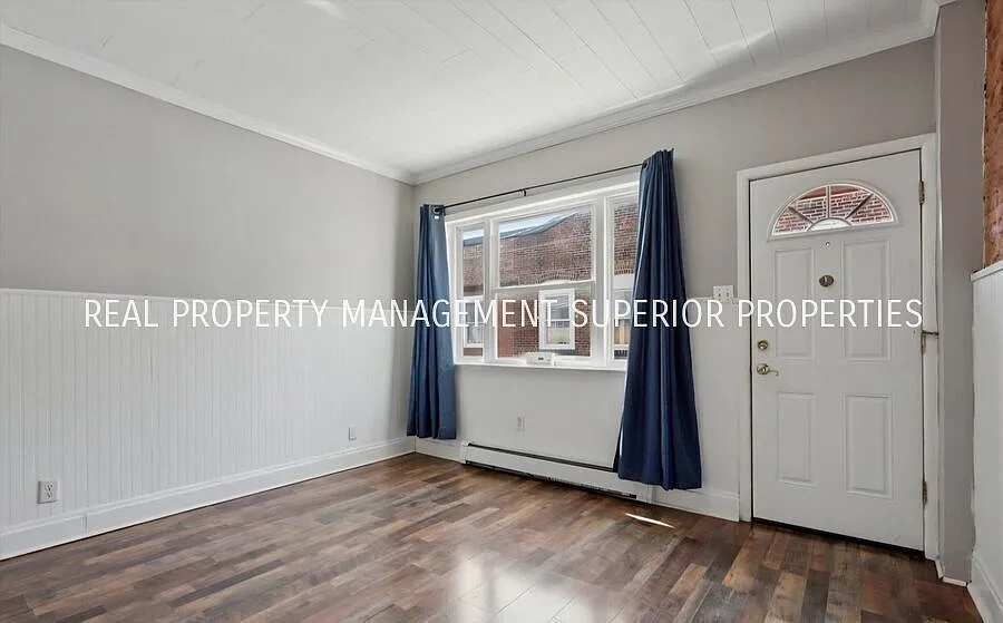 Charming 2-Bedroom Port Richmond Home with Beautiful Floors & Basement — Photo 4