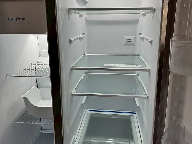 __ Refrigerator
"Brand-new stainless steel refrigerator _ clean, energy-efficient, and spacious for all your groceries."