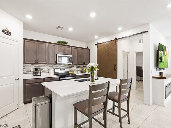 4th image of 9873 Ravenswood Peak Ave