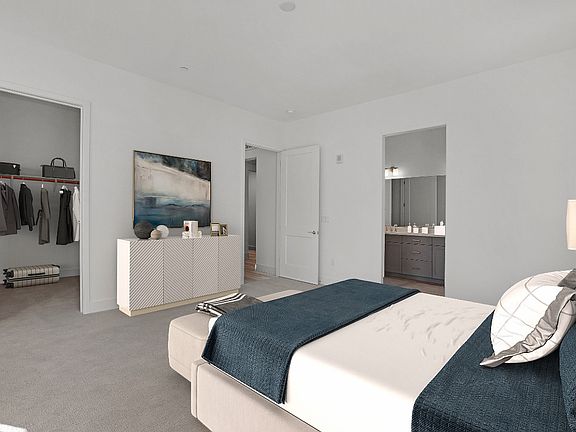 Luxurious primary bedroom suite