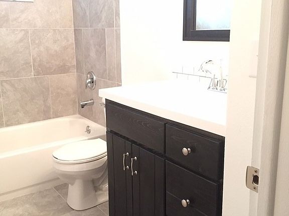 Main Floor Bathroom
						:
						Custom cabinetry, completely updated