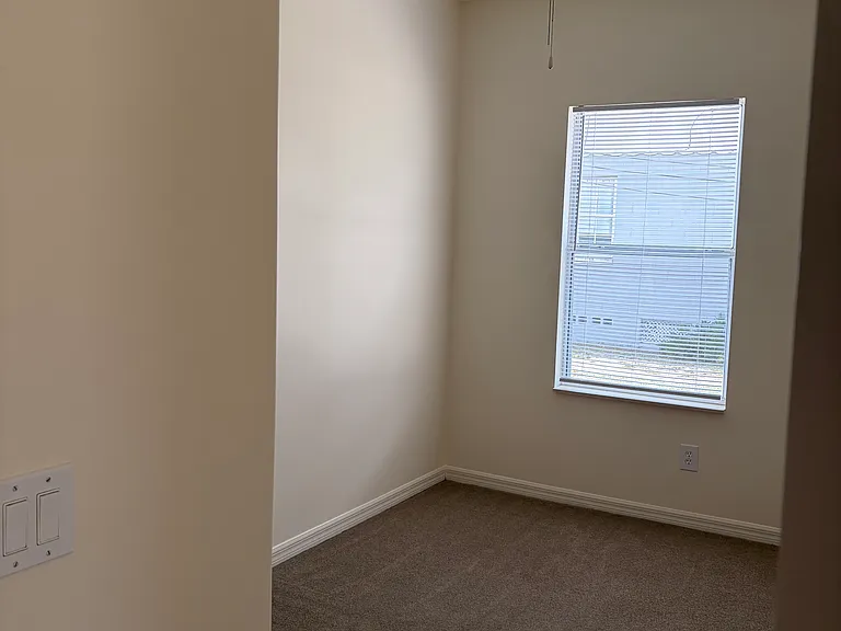 First bedroom with ceiling fan, spacious close. Bathroom connected right outside.