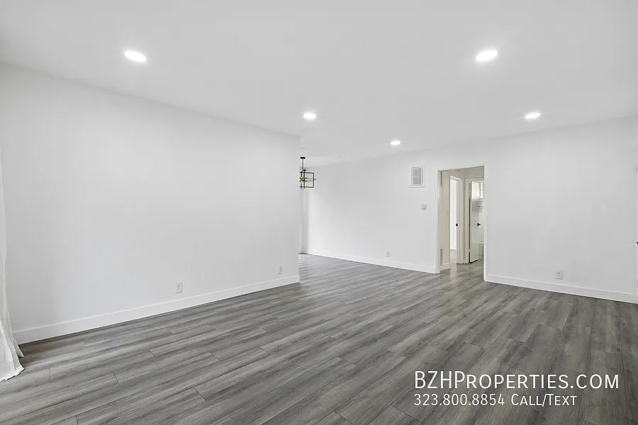 Sun-Filled Renovated 2 Bedroom with In-Unit Laundry — Photo 4