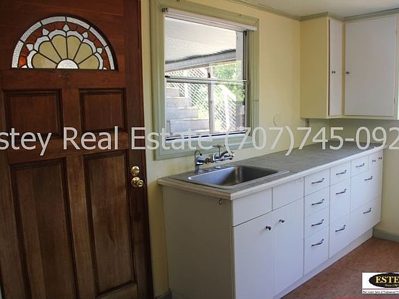 door to deck/left side of kitc