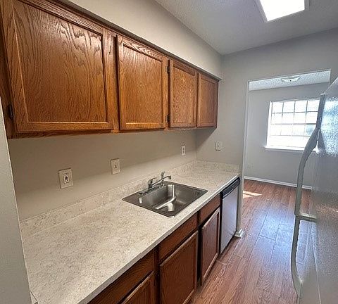 New countertops and stainless steel sink.