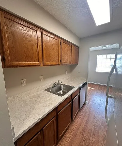 New countertops and stainless steel sink.