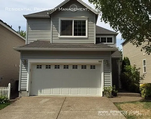 6445 NW Shelsam Ter photo 1