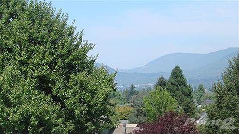 City lights twinkle at night and dreamy mountains views from the deck in the day.