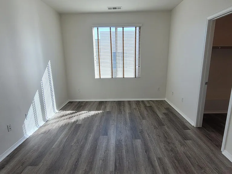 Large Primary Suite - facing east. Gorgeous morning light.