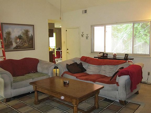 Easy access to the kitchen, breakfast nook, and back patio for entertaining!