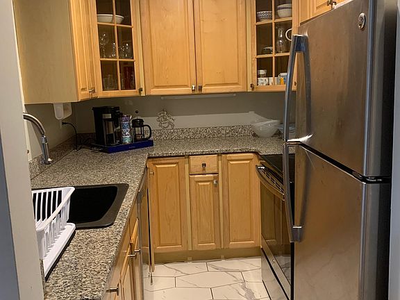 Kitchen, with brand new dishwasher. Microwave included.