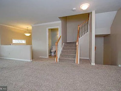 Living room with powder room