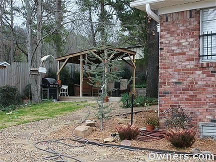 Side of house with sitting area