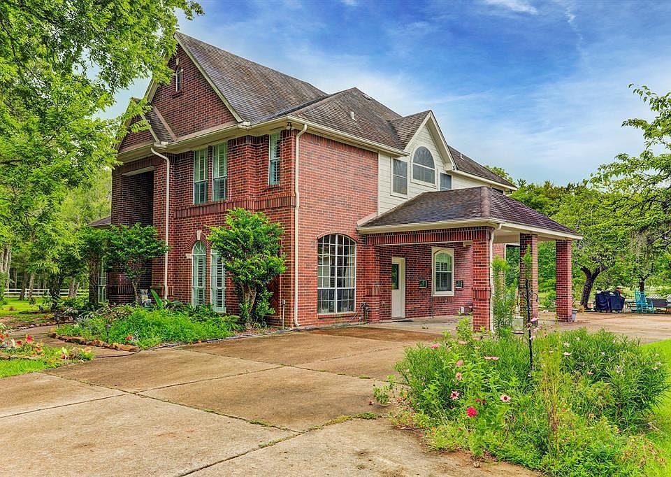 Welcome to 7830 Bee Hollow Ct, a 5 bedroom, 4 bath home with pool and barn on 4.5+ wooded acres!