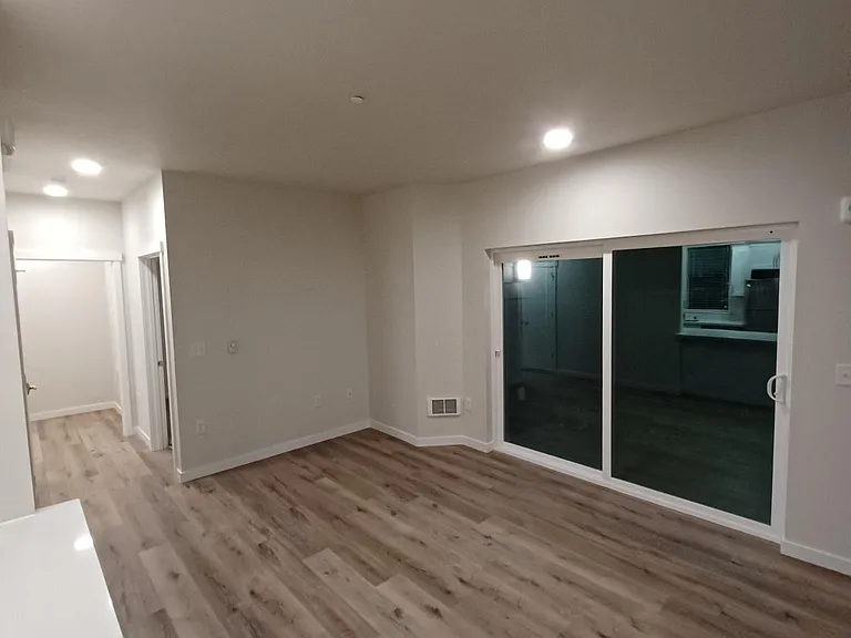 Large living area with seating at peninsula